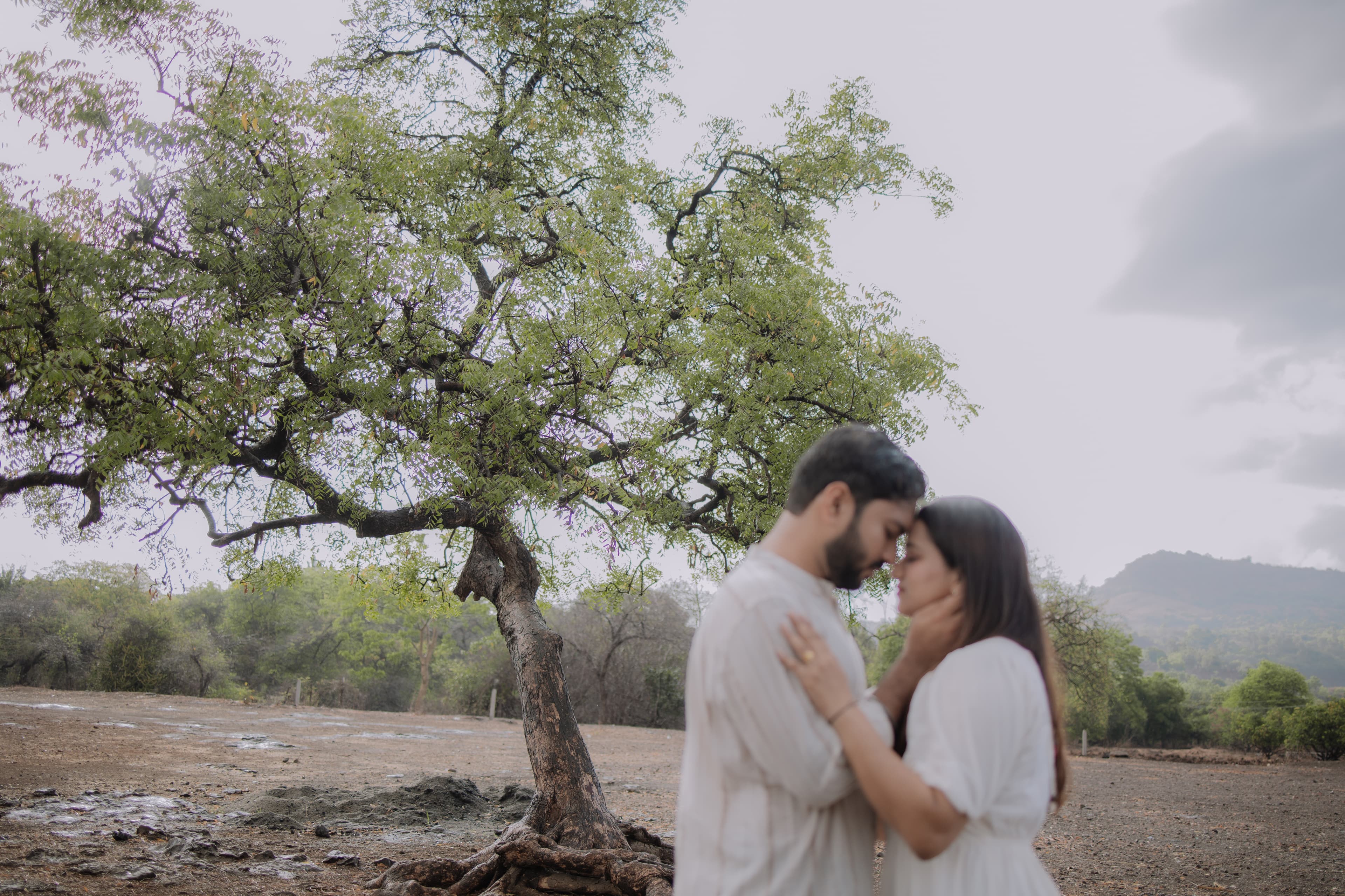 Couple embracing during pre-wedding shoot